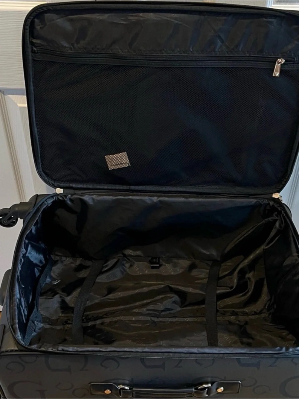 GUESS Logo Debossed Black Rolling Suitcase 24 “